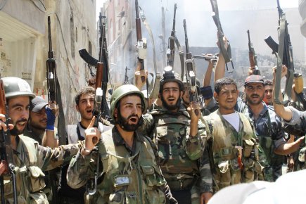 [résolu]Tensions en Syrie II - Page 41 534899-soldats-armee-syrienne-celebrent-reprise